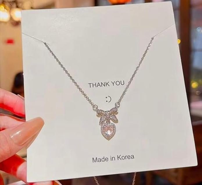 Elegant Heart Crystal Pendant Necklace with Bow, Sterling Silver Chain - Image 2