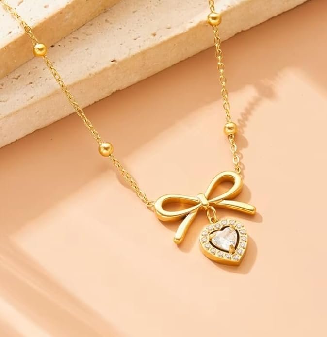 Elegant Gold-Plated Bow Necklace with Crystal Heart Pendant, Beaded Chain Design - Image 2