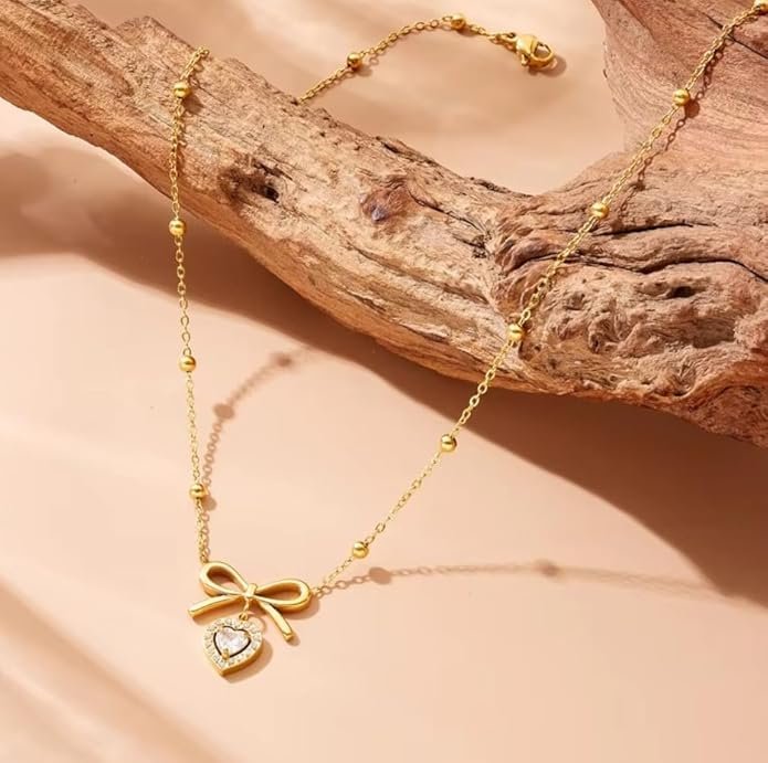 Elegant Gold-Plated Bow Necklace with Crystal Heart Pendant, Beaded Chain Design - Image 4